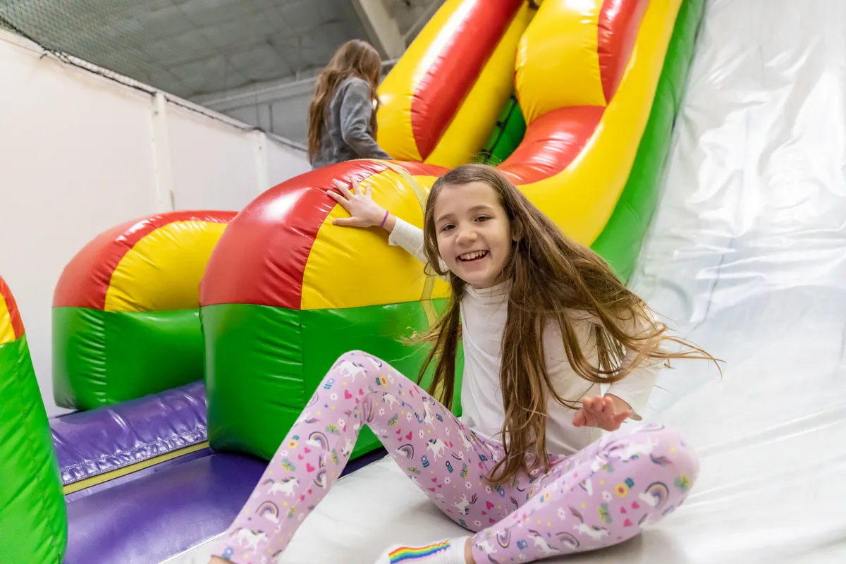 Inflatable FunZone indoor playground at Arena Sports Magnuson — official source image