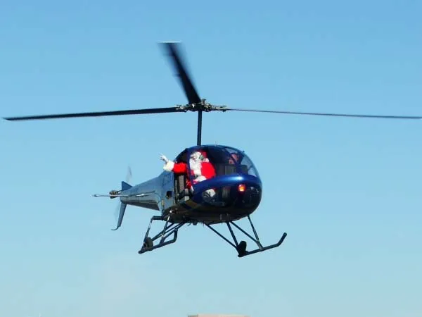 Santa Arrives by Helicopter at Hiller Aviation Museum — official source image